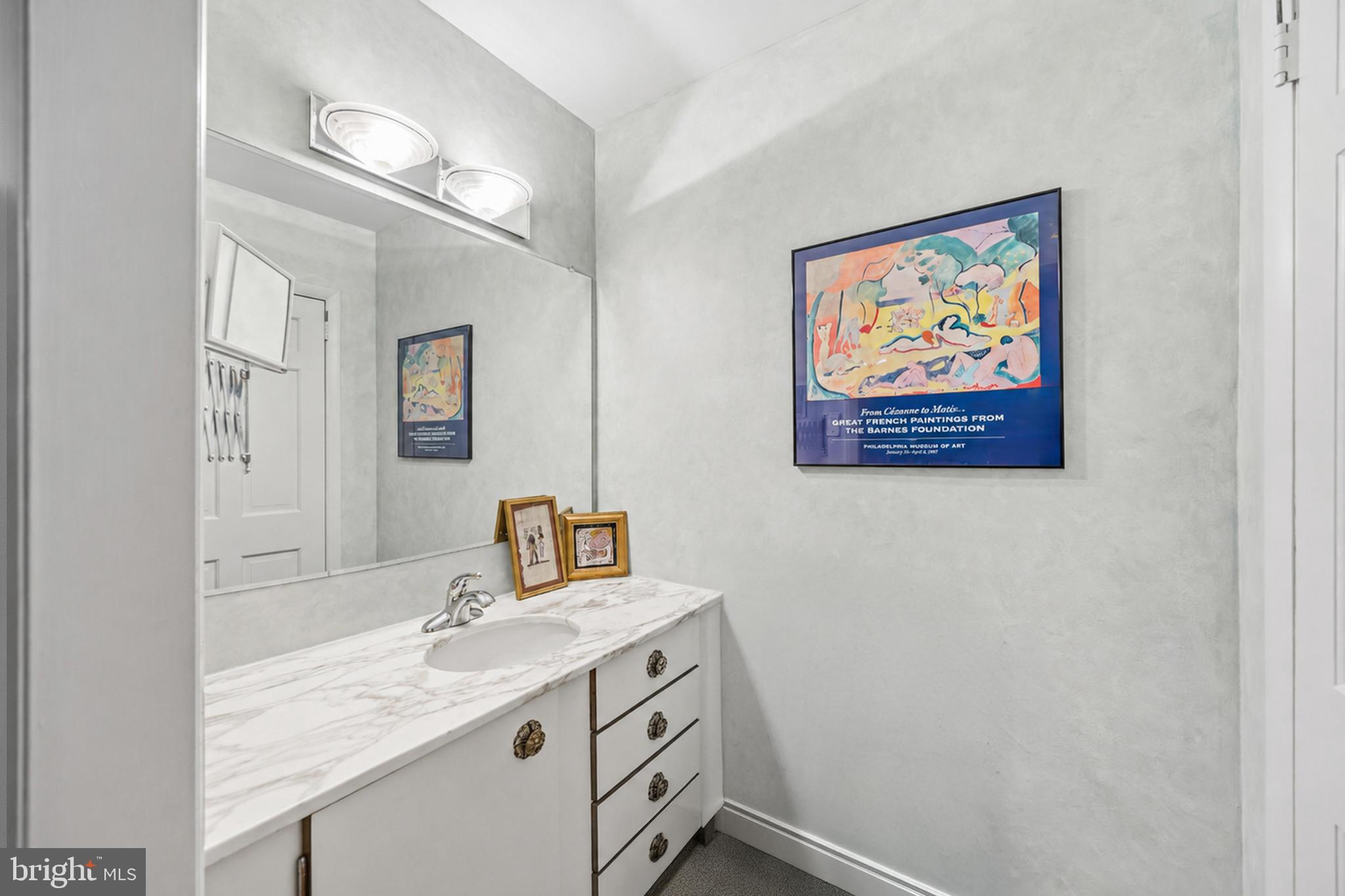 330 Bent Road Wyncote, PA 19095 - Photo 29 of 47 a bathroom with a granite countertop sink mirror and vanity