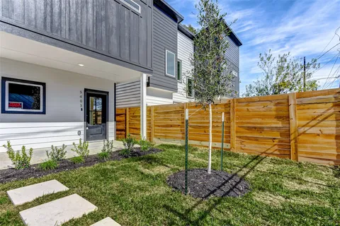 a view of a backyard with plants