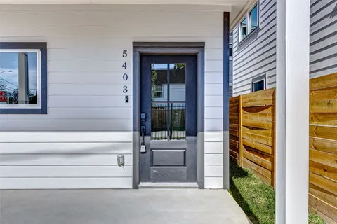 a front view of a house with a outdoor space