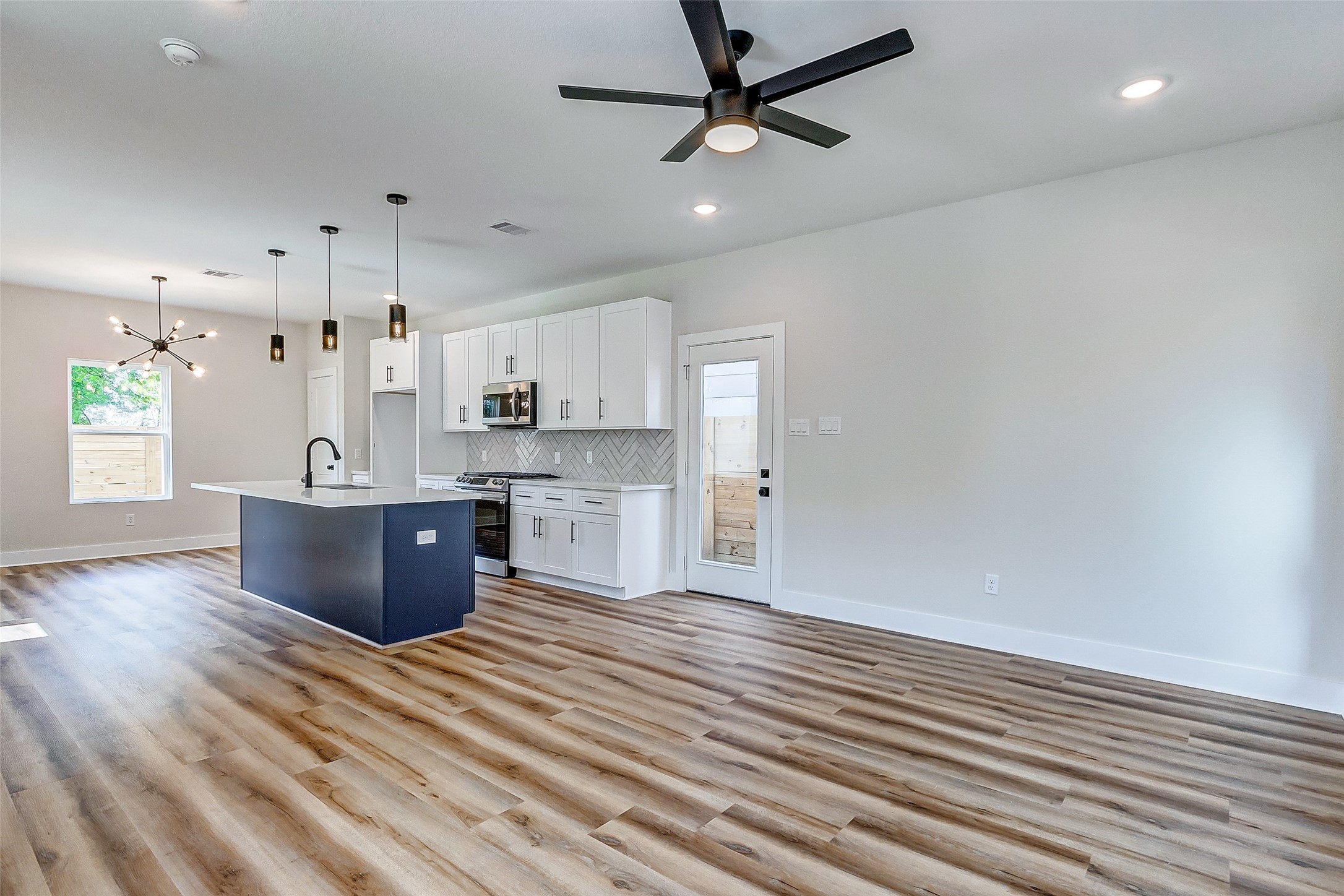 5407 Lee Street Houston, TX 77020 - Photo 7 of 36 a view of kitchen with wooden floor