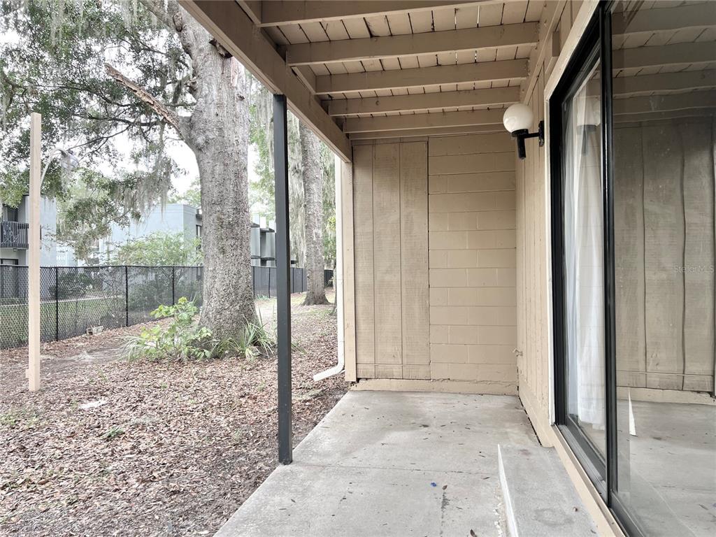 507 Northwest 39th Road, Unit 312 Gainesville, FL 32607 - Photo 26 of 34 a view of a glass door and the balcony