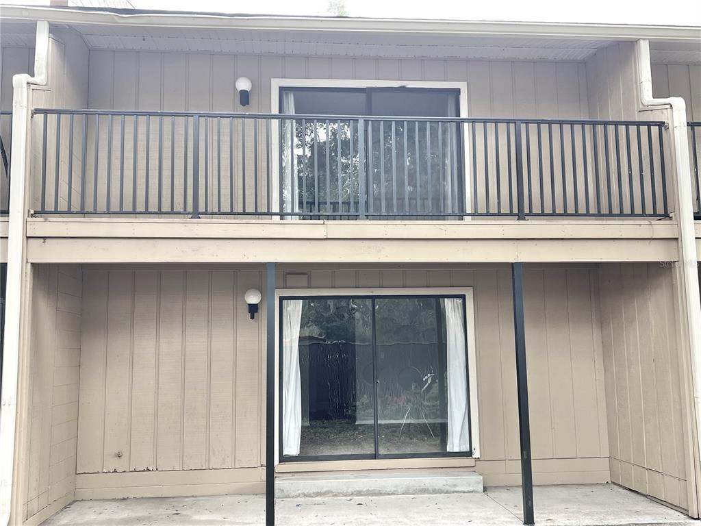 507 Northwest 39th Road, Unit 312 Gainesville, FL 32607 - Photo 28 of 34 a view of wooden door