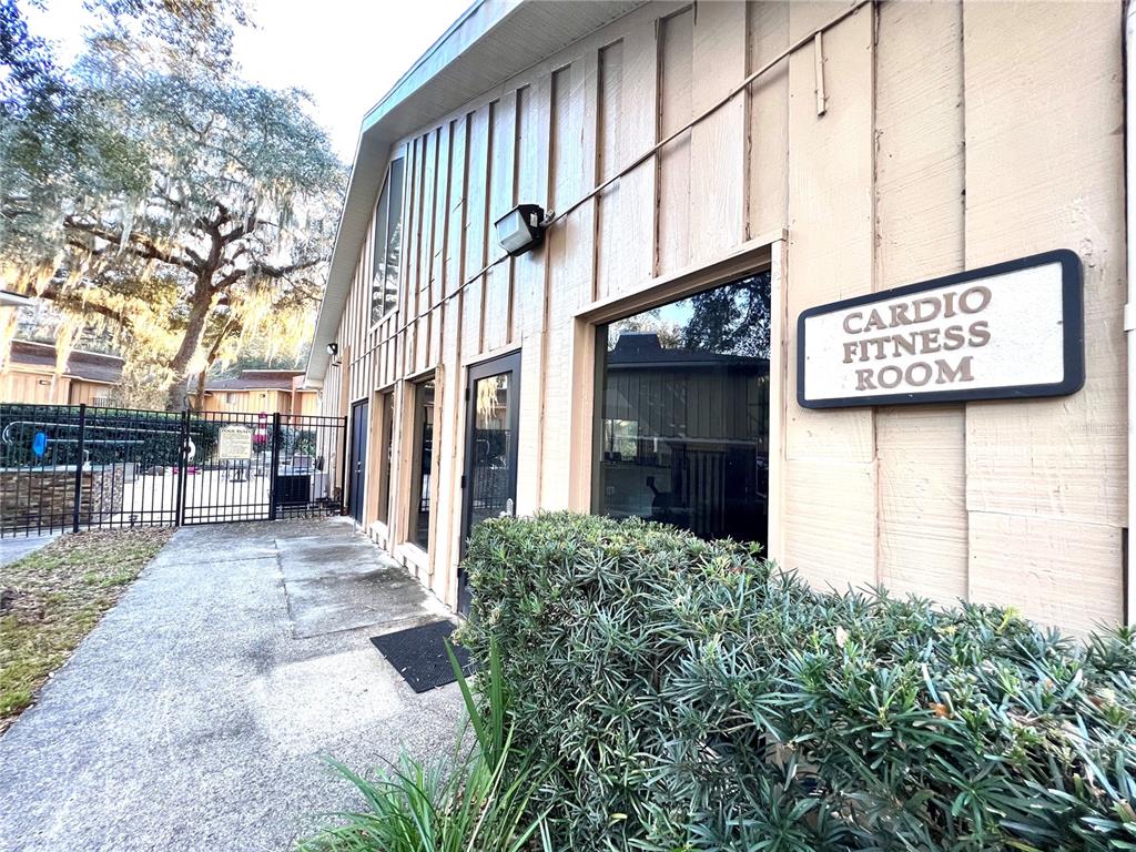 507 Northwest 39th Road, Unit 312 Gainesville, FL 32607 - Photo 30 of 34 a view of a street with building in the background