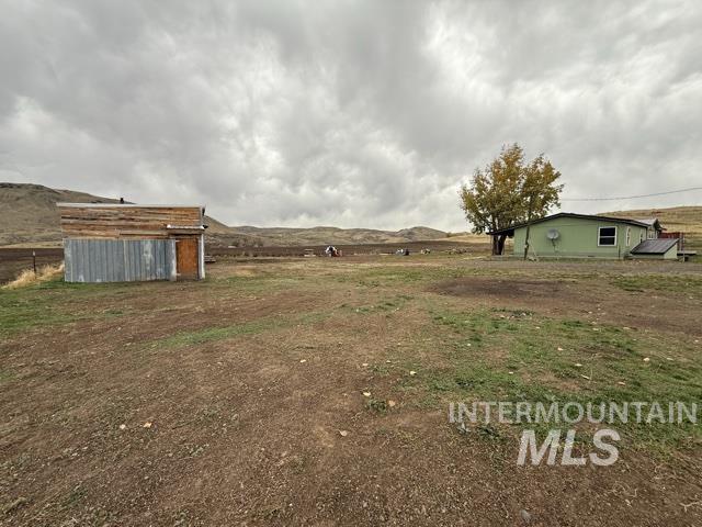 2284 Weiser River Road Weiser, ID 83672 - Photo 42 of 43 View of yard with an outdoor structure and a view of rural / pastoral area
