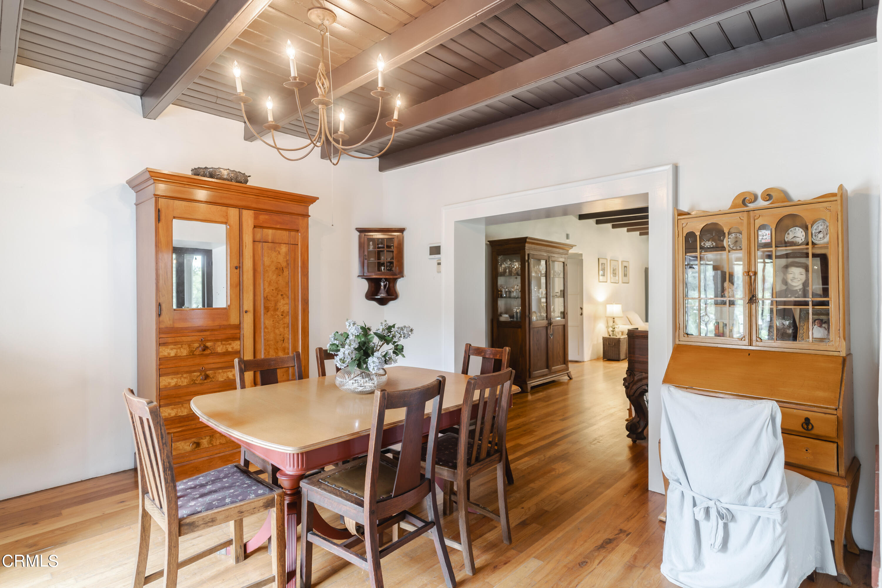 919 Puddingstone Drive La Verne, CA 91750 - Photo 14 of 42 a view of a dining room with furniture window and wooden floor