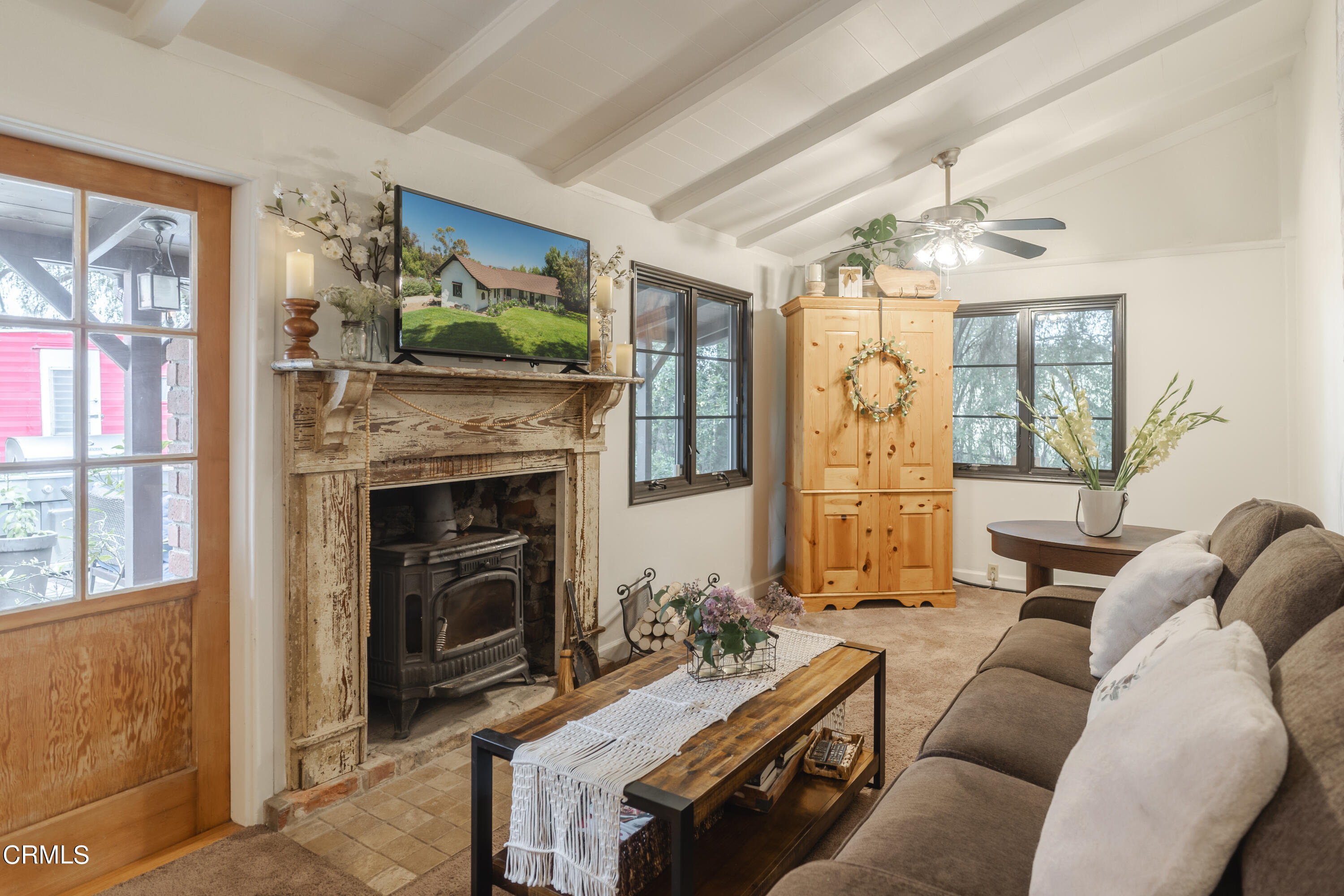 919 Puddingstone Drive La Verne, CA 91750 - Photo 15 of 42 a living room with furniture and a fireplace