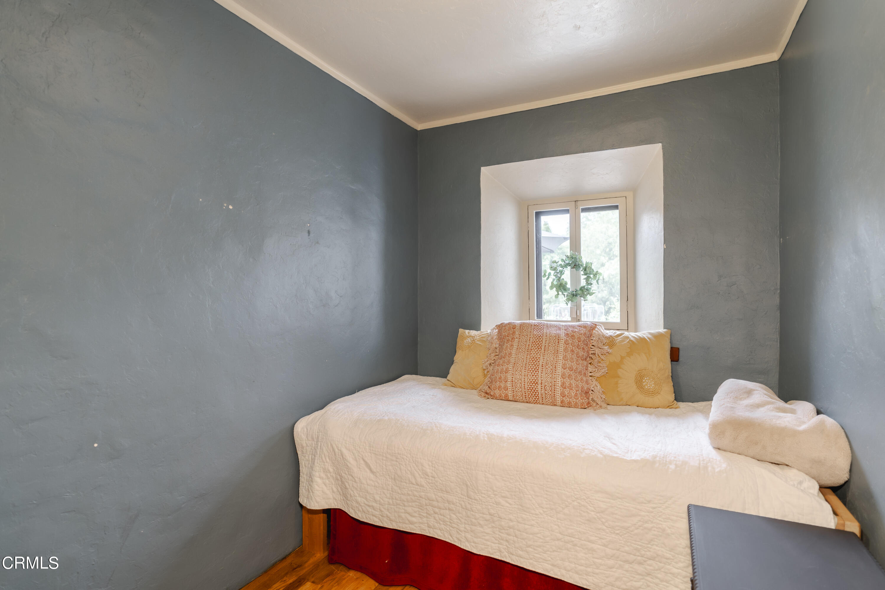 919 Puddingstone Drive La Verne, CA 91750 - Photo 18 of 42 a bedroom with a bed and window