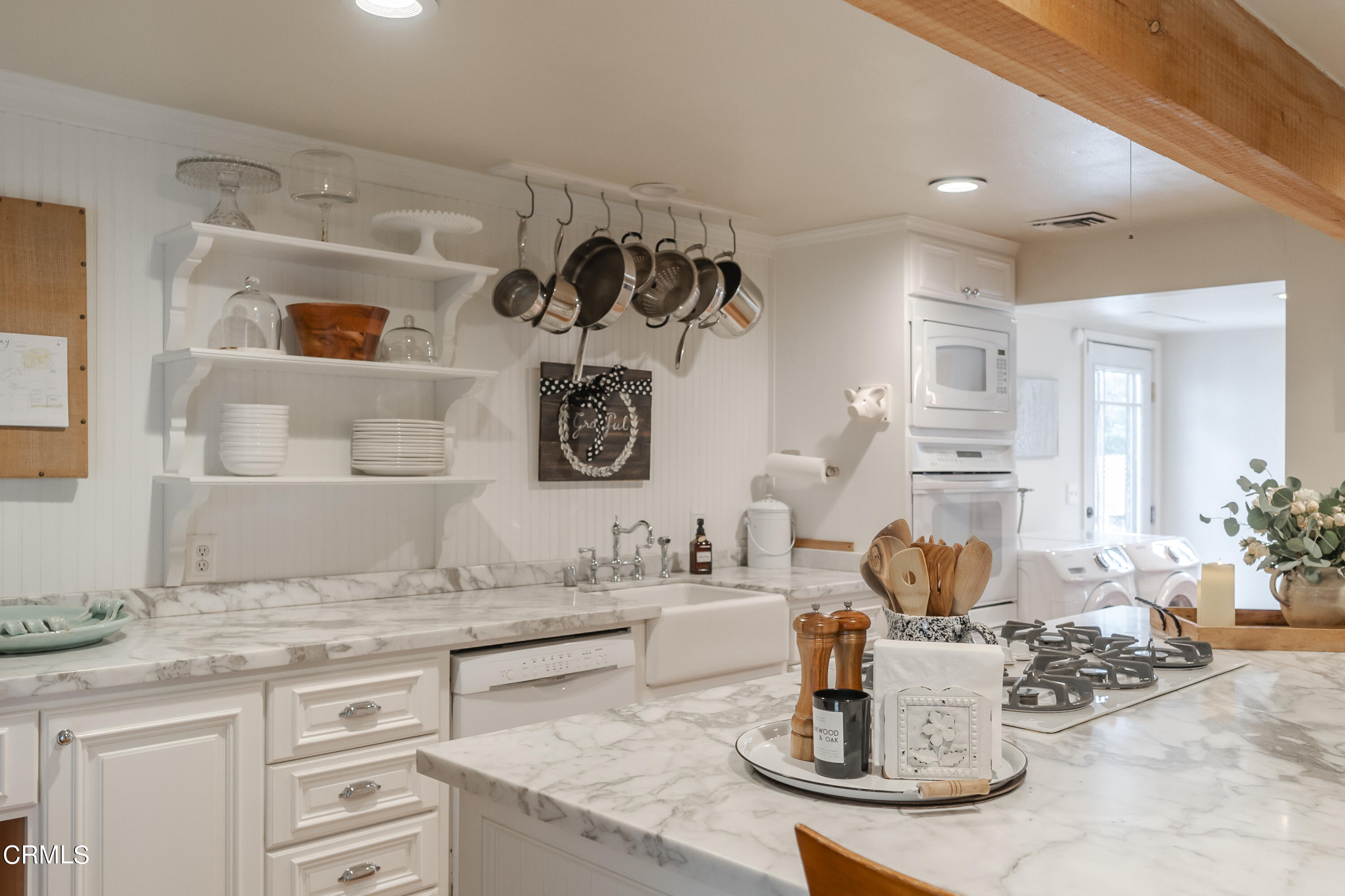 919 Puddingstone Drive La Verne, CA 91750 - Photo 26 of 42 a kitchen with a stove and cabinets