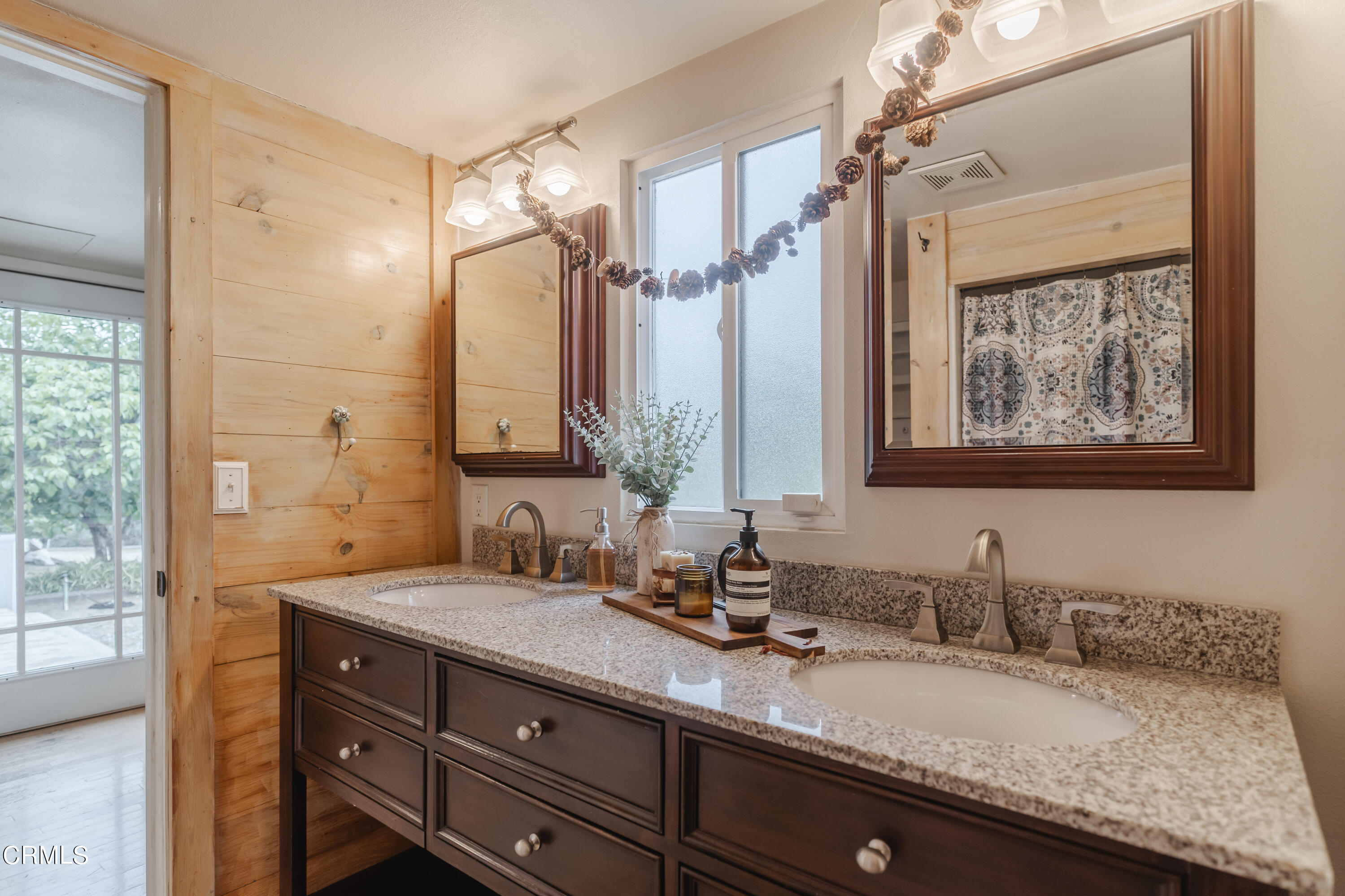 919 Puddingstone Drive La Verne, CA 91750 - Photo 30 of 42 a bathroom with a granite countertop double vanity sink mirror and double