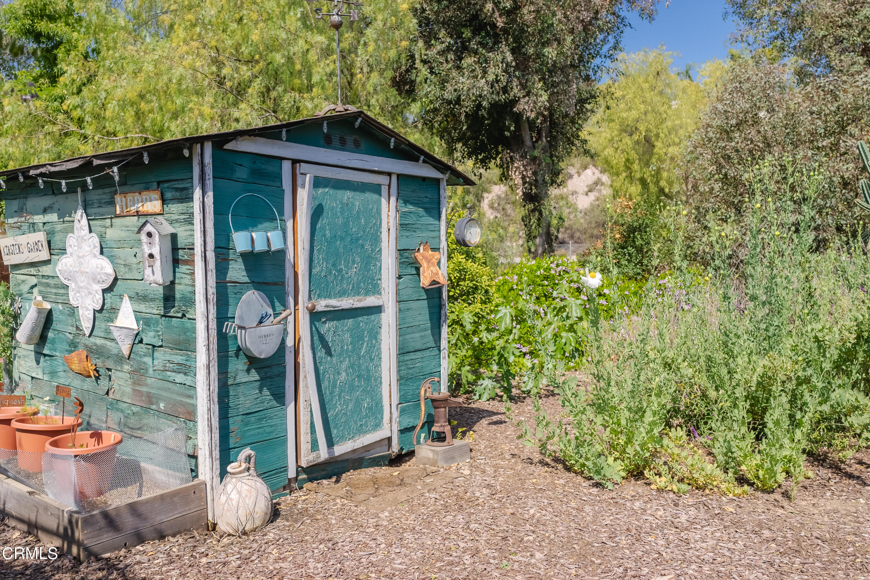 919 Puddingstone Drive La Verne, CA 91750 - Photo 37 of 42 a view of a wooden door and a yard