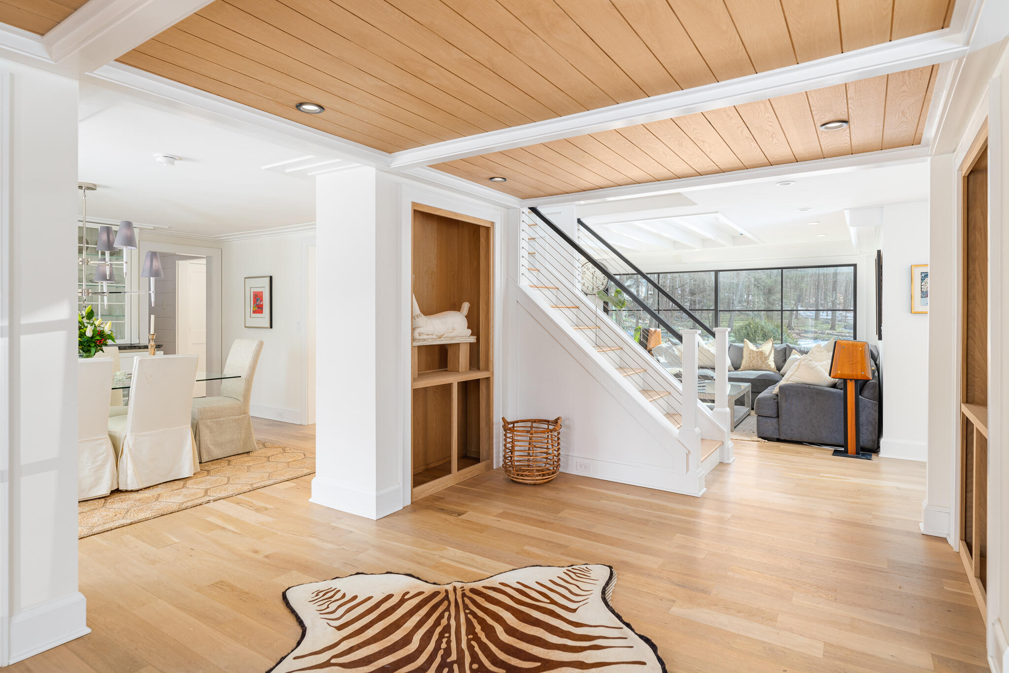 65 Mill Road New Canaan, CT 06840 - Photo 11 of 42 a view of entryway livingroom and hall with wooden floor