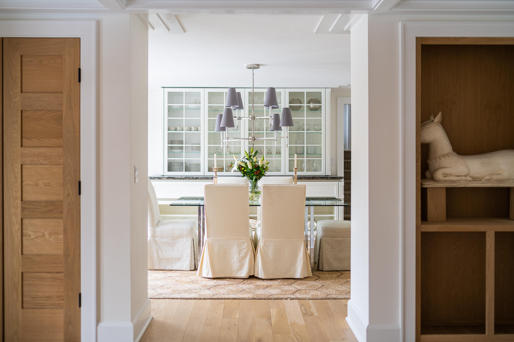 65 Mill Road New Canaan, CT 06840 - Photo 15 of 42 a view of a dining room with windows