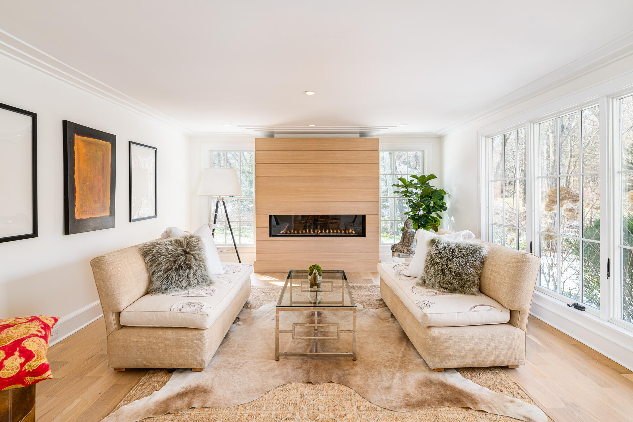 65 Mill Road New Canaan, CT 06840 - Photo 17 of 42 a living room with furniture and a large window