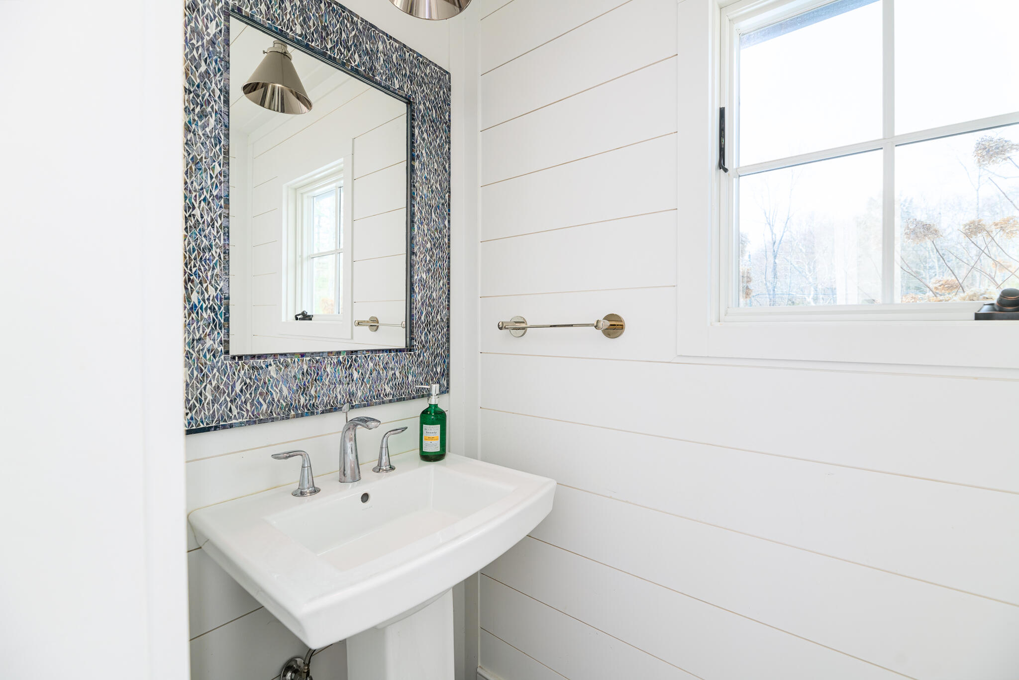 65 Mill Road New Canaan, CT 06840 - Photo 21 of 42 a bathroom with a sink and a mirror