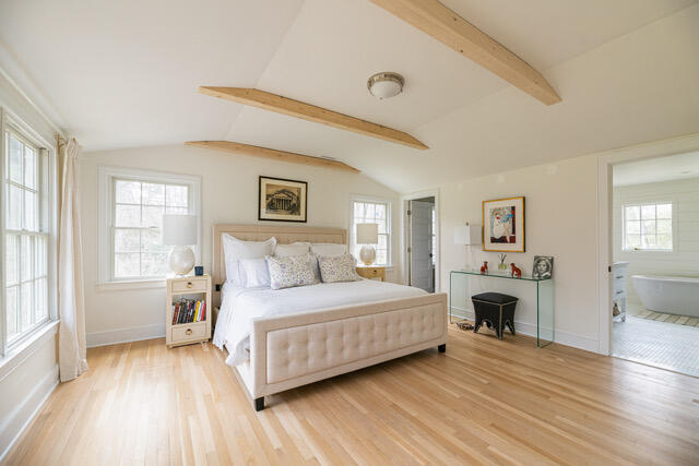 65 Mill Road New Canaan, CT 06840 - Photo 28 of 42 a bedroom with a large bed and a couch