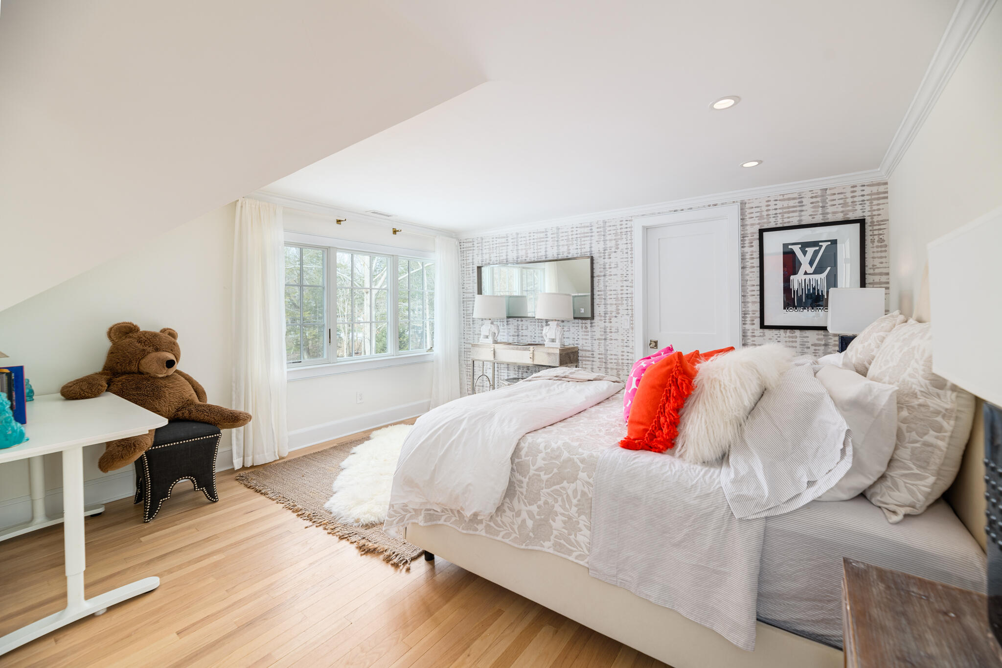 65 Mill Road New Canaan, CT 06840 - Photo 37 of 42 a bed room with a bed and a chair