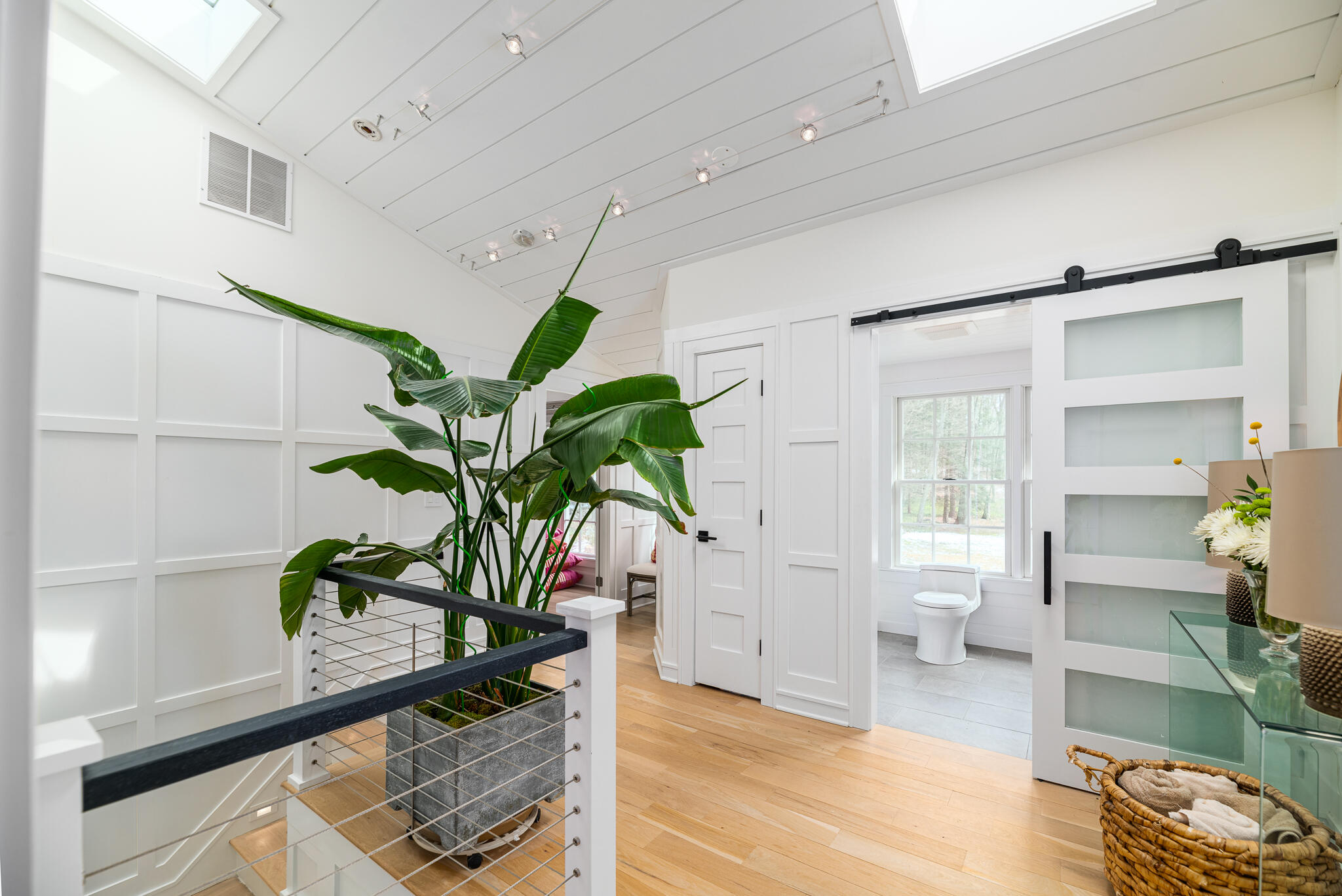 65 Mill Road New Canaan, CT 06840 - Photo 40 of 42 a view of living room filled with furniture and a potted plant