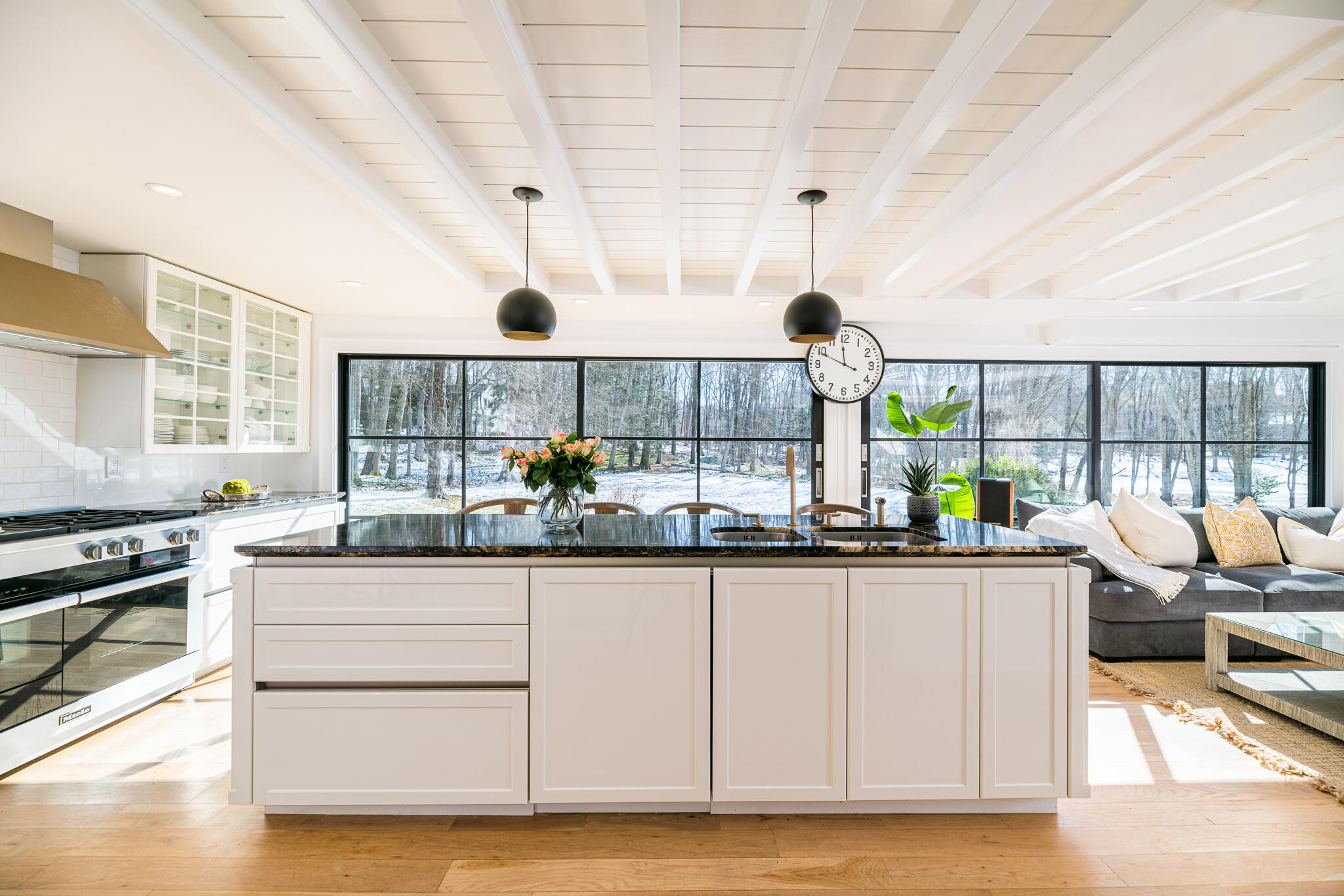 65 Mill Road New Canaan, CT 06840 - Photo 5 of 42 a kitchen with granite countertop a sink and cabinets