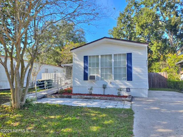 a view of a porch with a bench