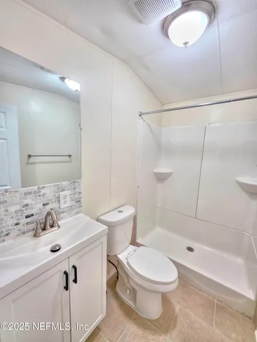 a swimming pool view with a outdoor space