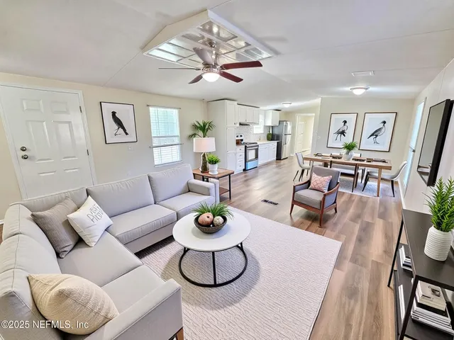 a kitchen with a sink and a stove