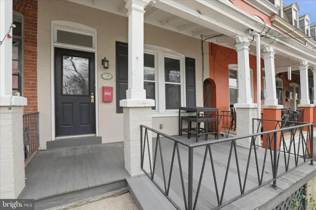 a front view of a house with glass door