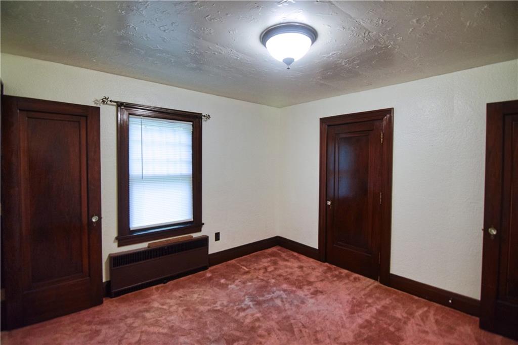 3765 Highway 257 Seneca, PA 16346 - Photo 21 of 42 an empty room with windows and closet