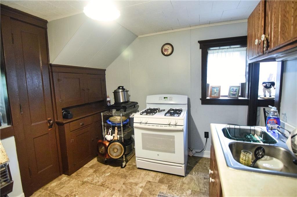 3765 Highway 257 Seneca, PA 16346 - Photo 33 of 42 a kitchen with a stove and a refrigerator
