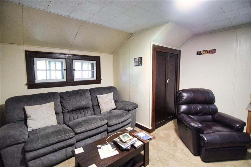 3765 Highway 257 Seneca, PA 16346 - Photo 35 of 42 a living room with furniture and a window