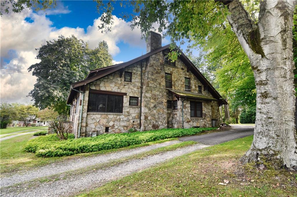 3765 Highway 257 Seneca, PA 16346 - Photo 39 of 42 a front view of a house with garden