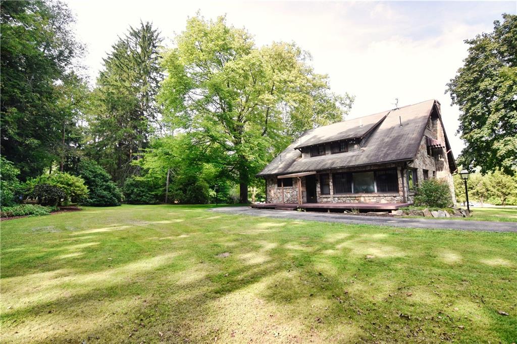 3765 Highway 257 Seneca, PA 16346 - Photo 42 of 42 a view of a house with a yard and sitting area