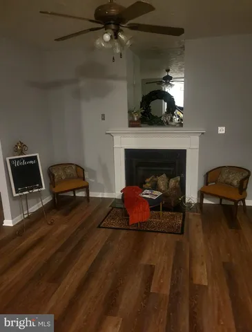 a kitchen with stainless steel appliances granite countertop a stove a microwave and cabinets