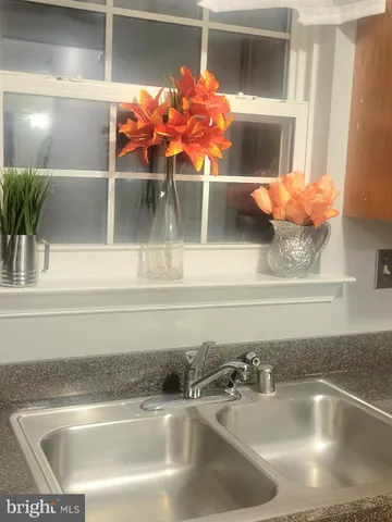 a close view of sink and microwave