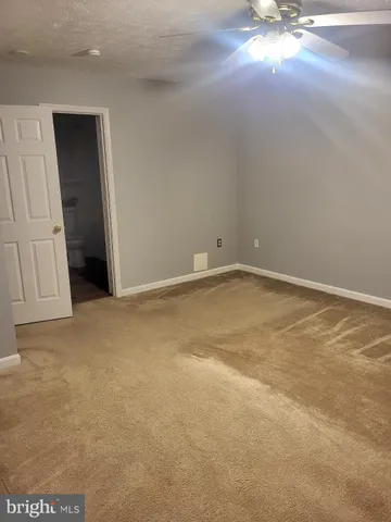 a bathroom with a sink a toilet and a bathtub