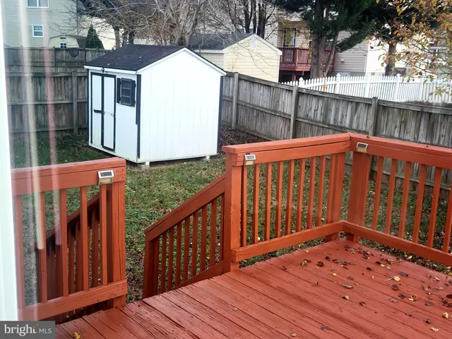 a bedroom with a bed and a table in it