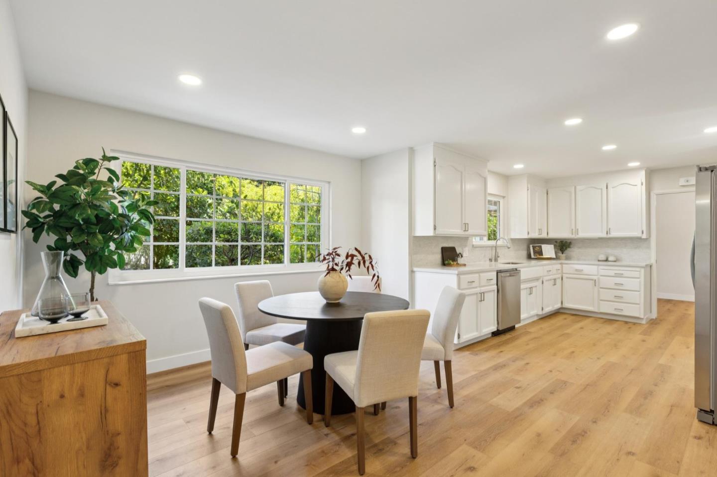 755 Santa Rita Avenue Los Altos, CA 94022 - Photo 15 of 50 a view of a dining room with furniture window and outside view