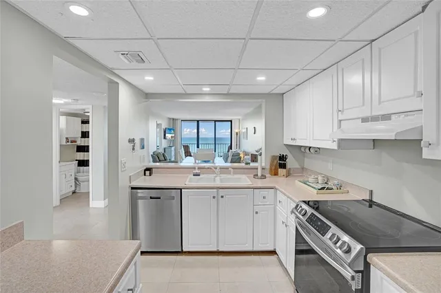 a bedroom with a bed and a desk