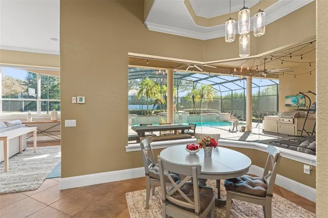 a kitchen that has a lot of cabinets in it and appliances
