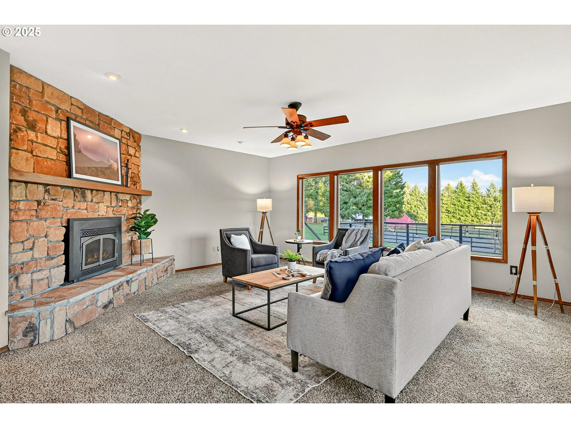 37902 Southeast Porter Road Estacada, OR 97023 - Photo 12 of 48 a living room with furniture and a fireplace