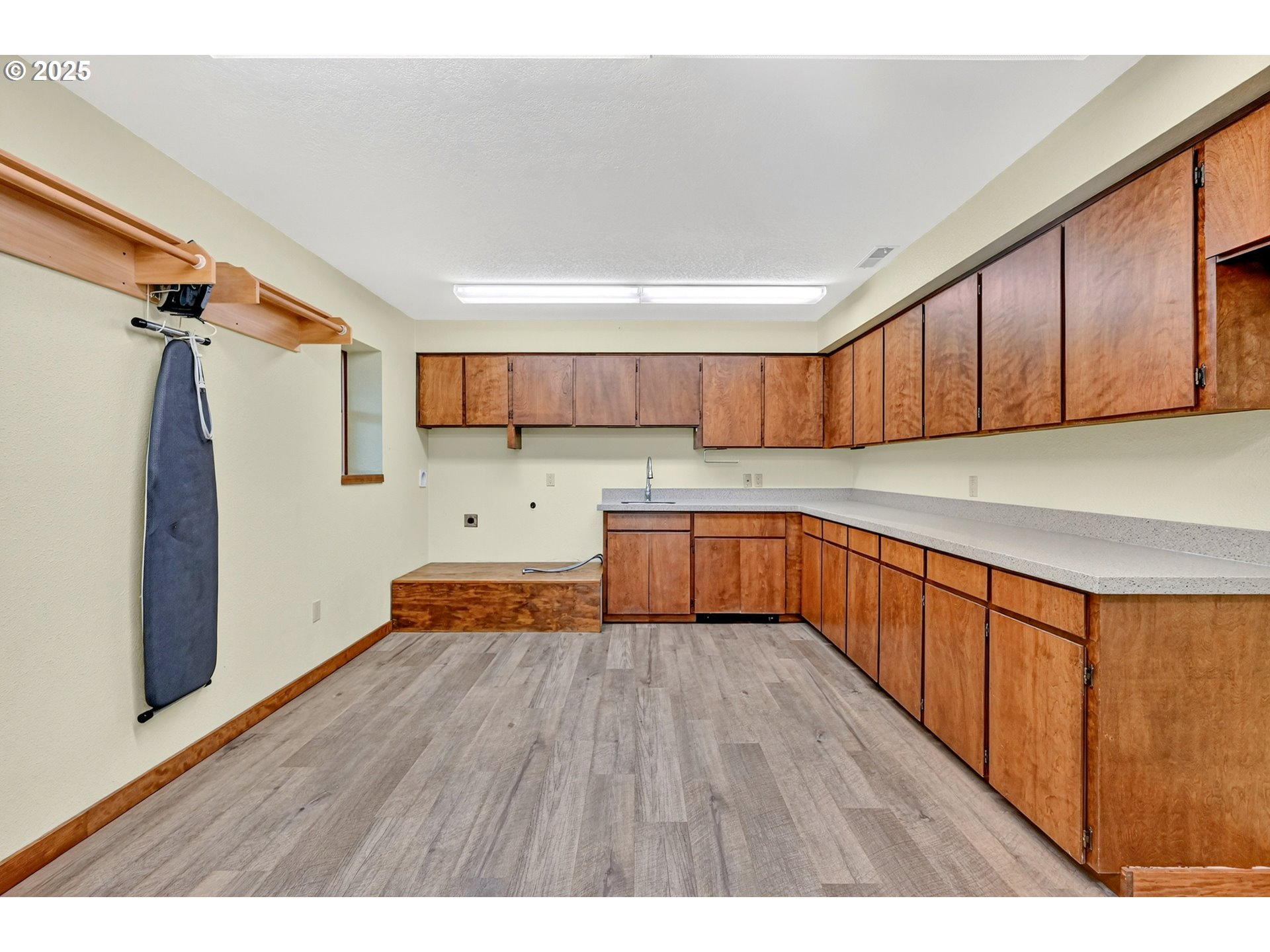 37902 Southeast Porter Road Estacada, OR 97023 - Photo 23 of 48 a kitchen with wooden floors and wooden cabinets