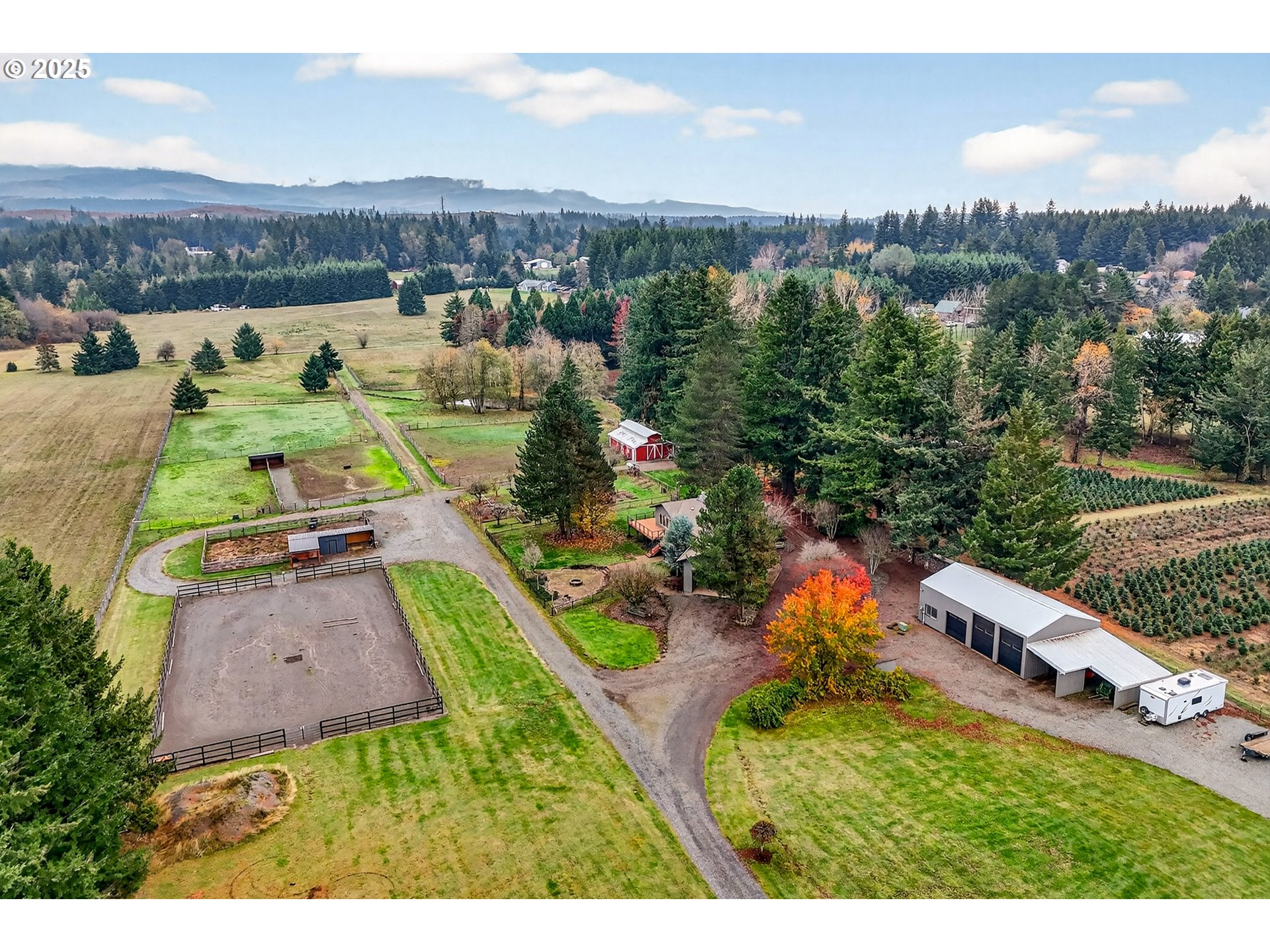 37902 Southeast Porter Road Estacada, OR 97023 - Photo 34 of 48 an aerial view of a house with a garden and lake view