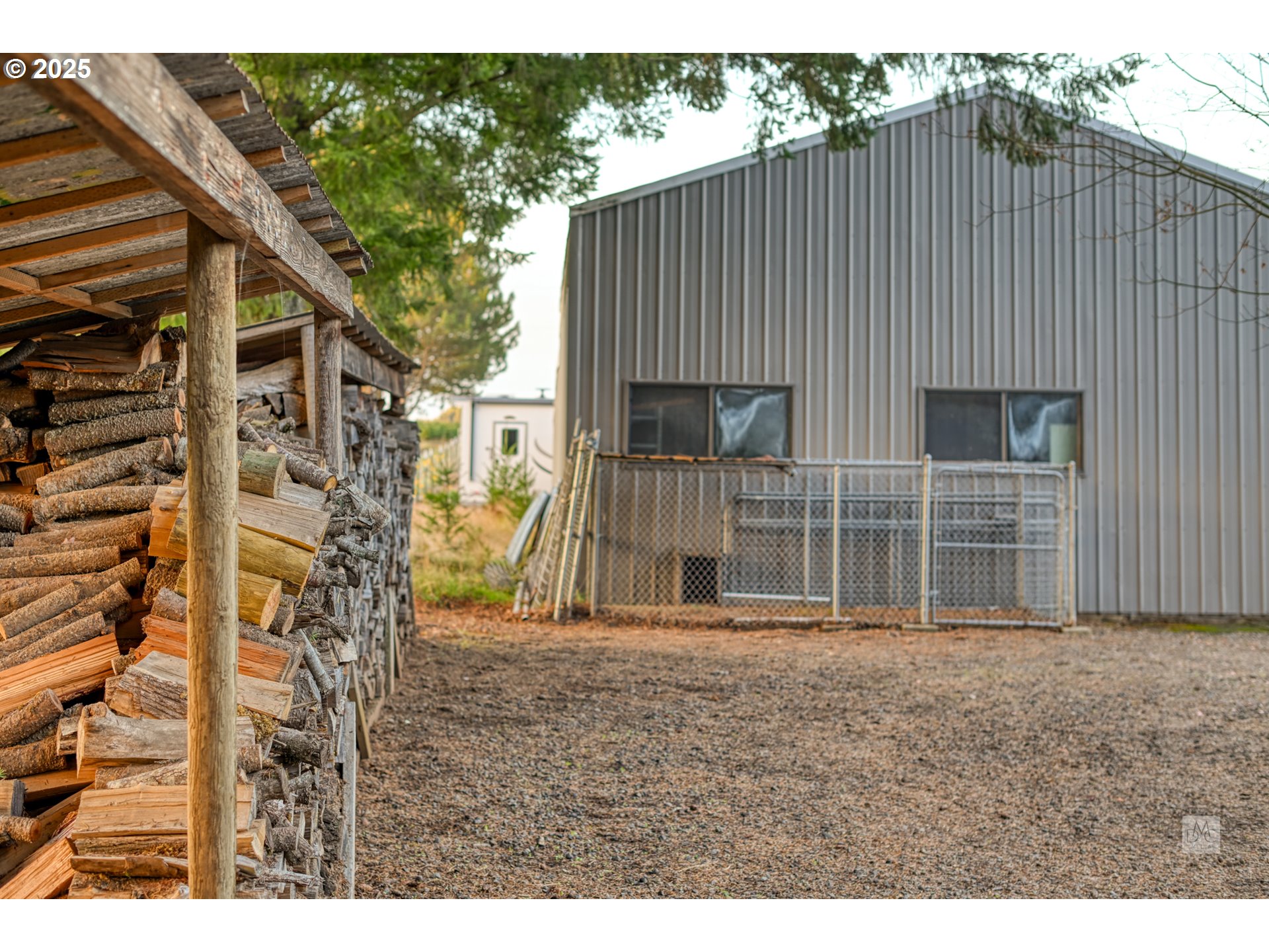 37902 Southeast Porter Road Estacada, OR 97023 - Photo 37 of 48 a backyard of a house with large trees