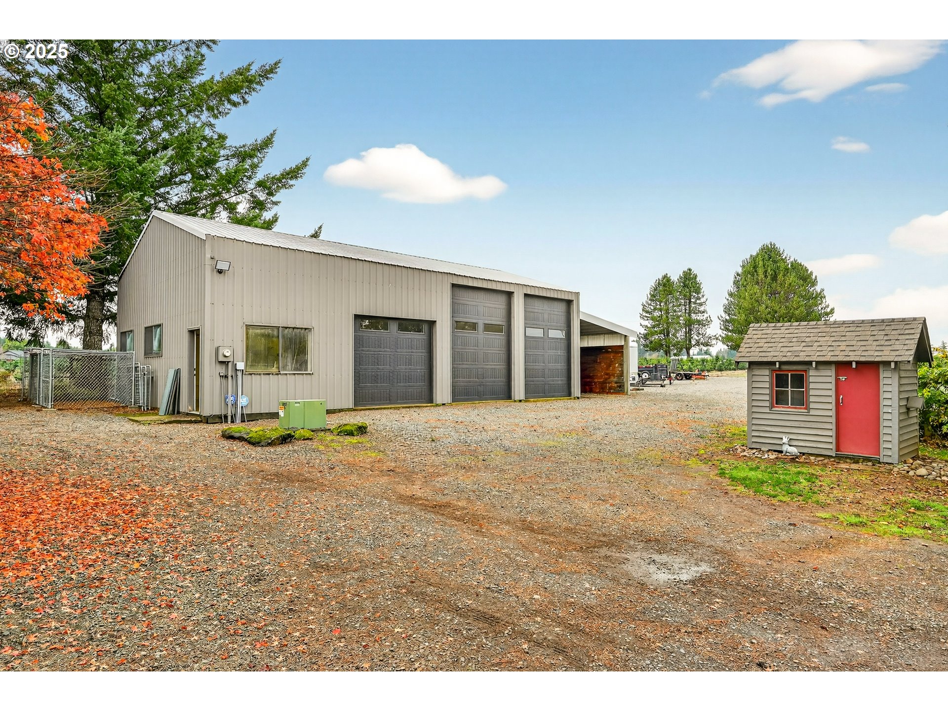 37902 Southeast Porter Road Estacada, OR 97023 - Photo 38 of 48 a view of a house with a yard and garage