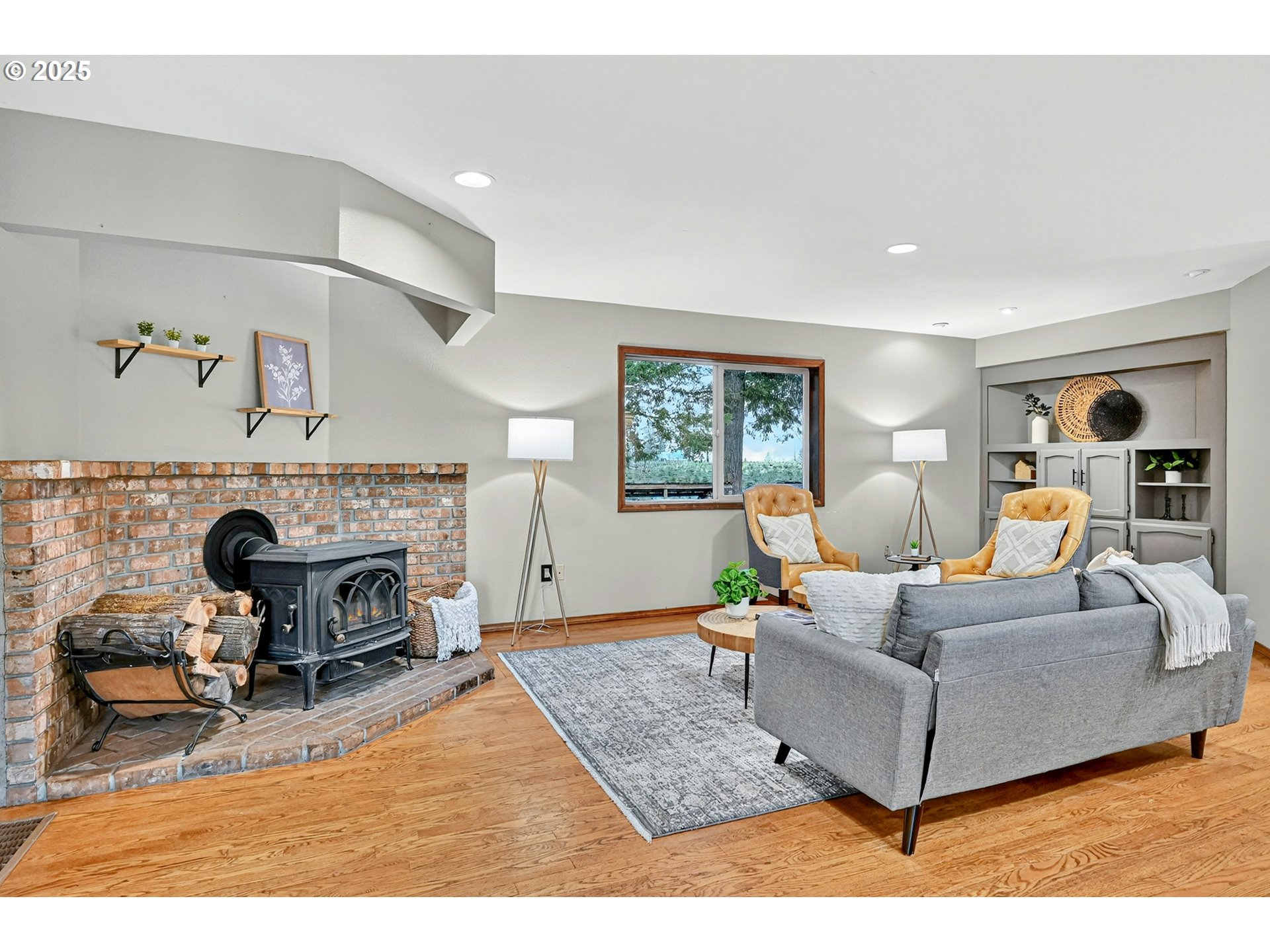 37902 Southeast Porter Road Estacada, OR 97023 - Photo 6 of 48 a living room with furniture and a fireplace