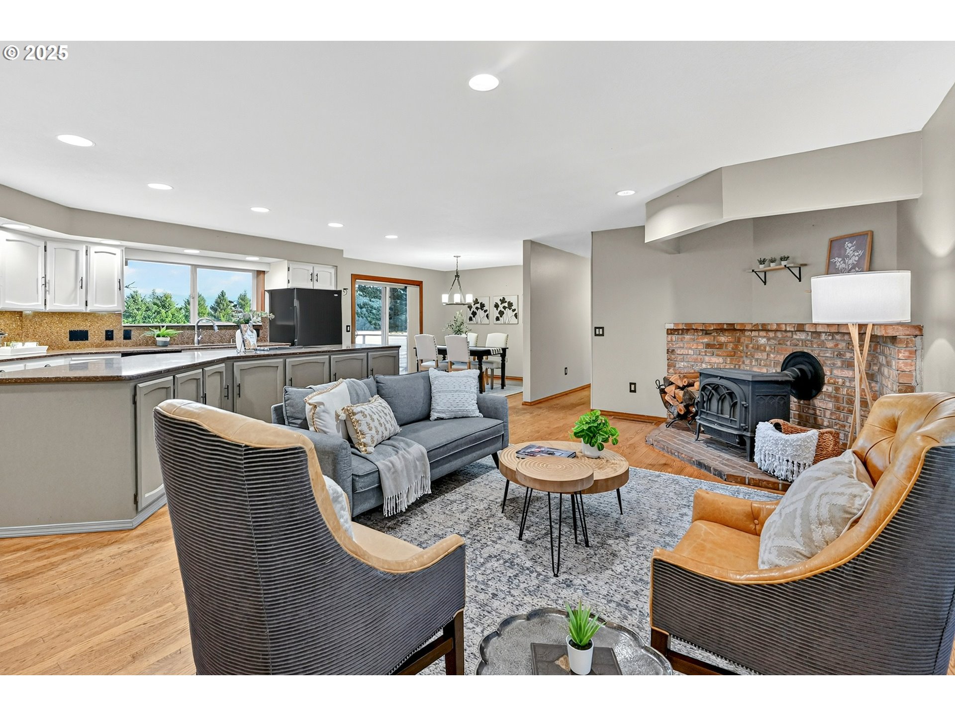 37902 Southeast Porter Road Estacada, OR 97023 - Photo 7 of 48 a living room with fireplace furniture and a wooden floor