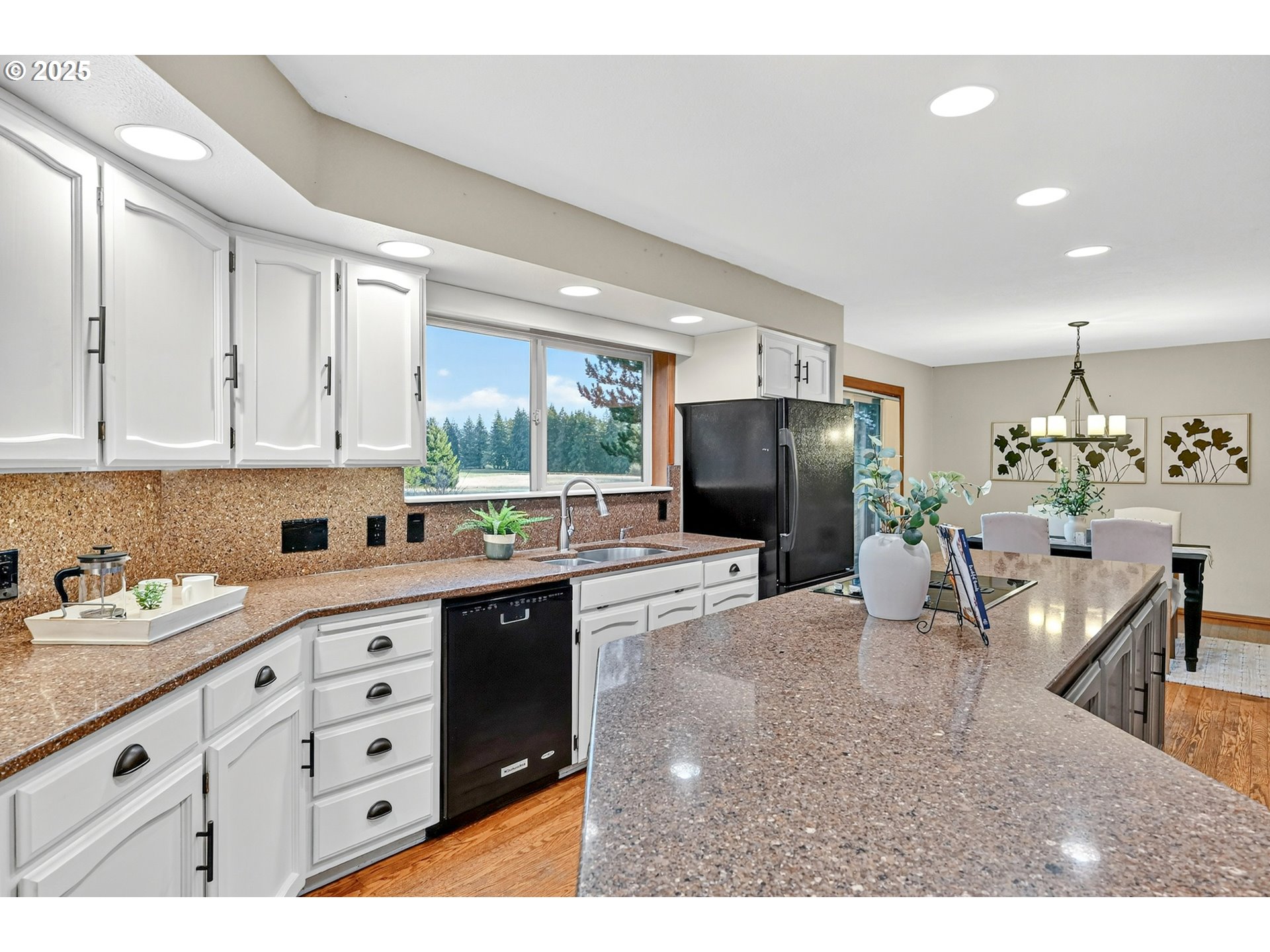 37902 Southeast Porter Road Estacada, OR 97023 - Photo 9 of 48 a kitchen with stainless steel appliances kitchen island granite countertop a refrigerator and cabinets