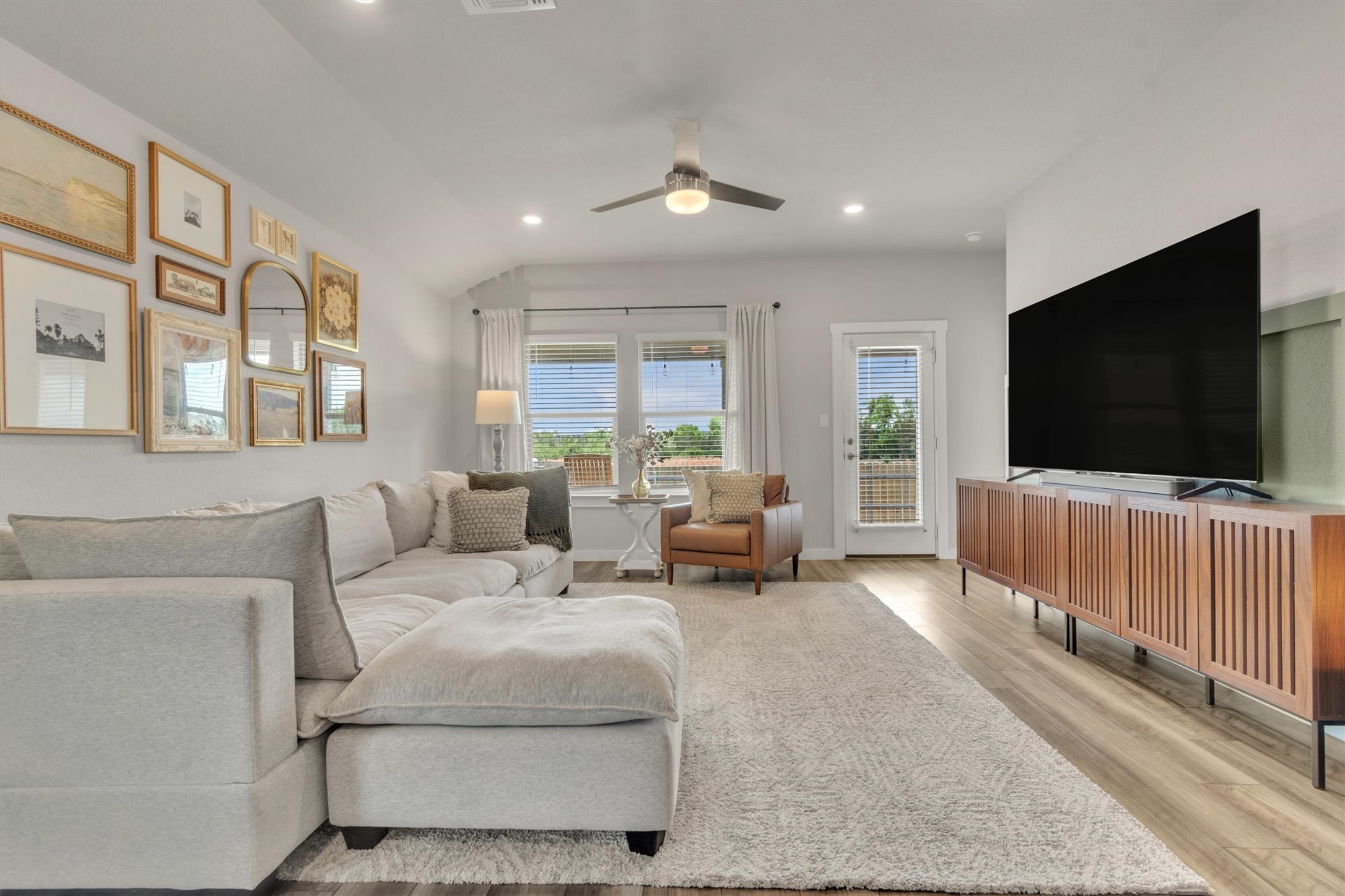 1008 Tipton Street Georgetown, TX 78633 - Photo 10 of 39 a living room with furniture and a flat screen tv