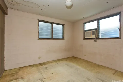 a view of a room that has a window in it