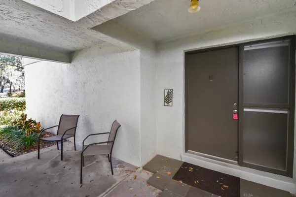 a view of a park with large trees