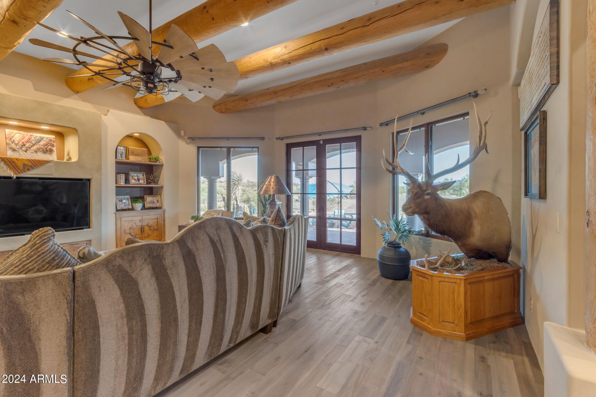 13330 East Jomax Road Scottsdale, AZ 85262 - Photo 105 of 164 a living room with furniture fireplace and flat screen tv